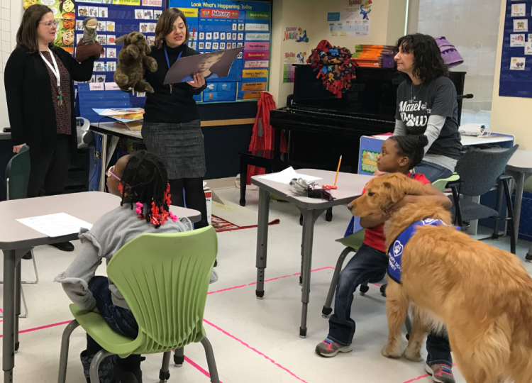Students in Ms. Larissa's Elementary Classroom during a Second Step Lesson, with a special visit from Sparky and Sue